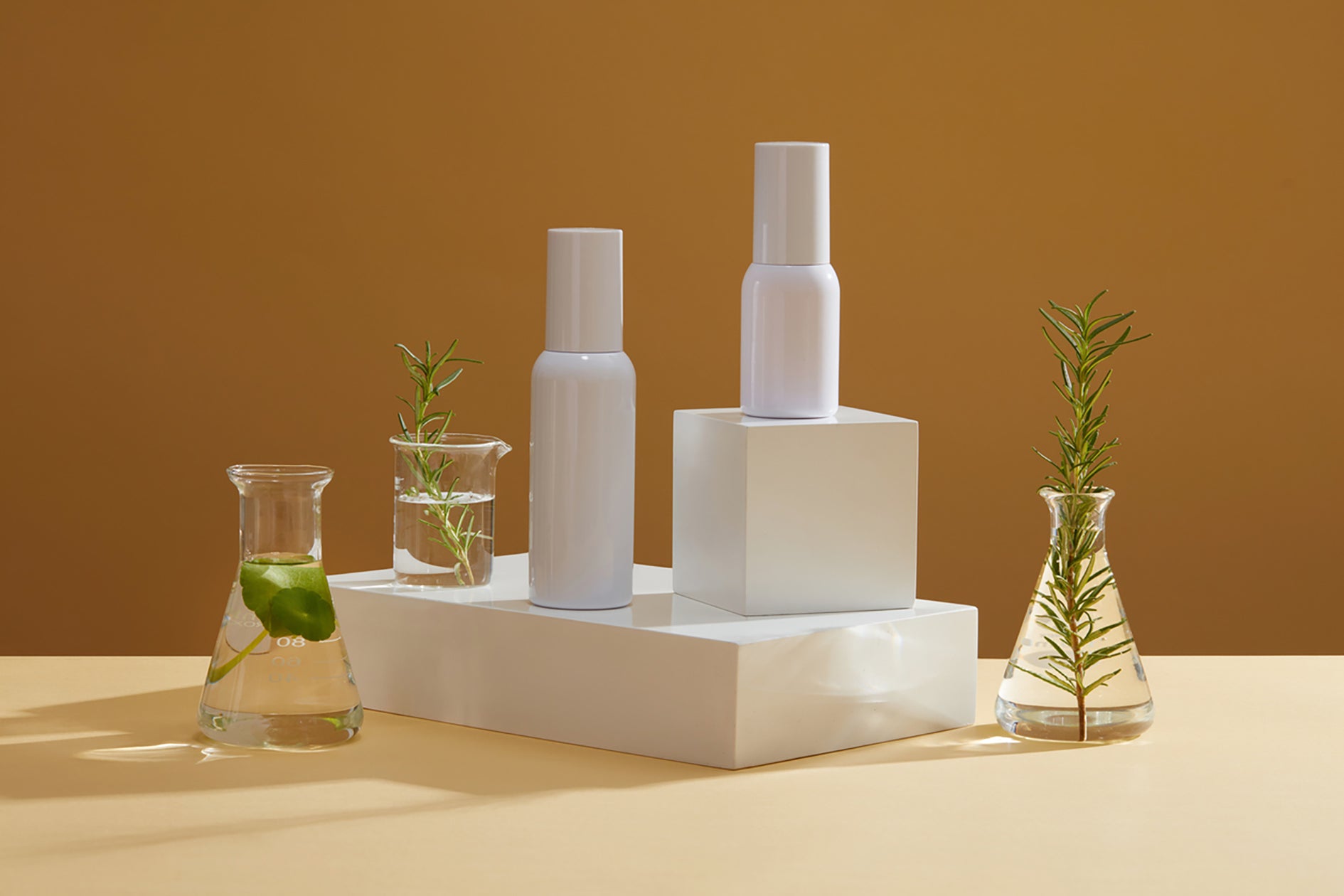 Collection of bestselling skincare products displayed on a spa towel, featured at Natural Beauty Spa.