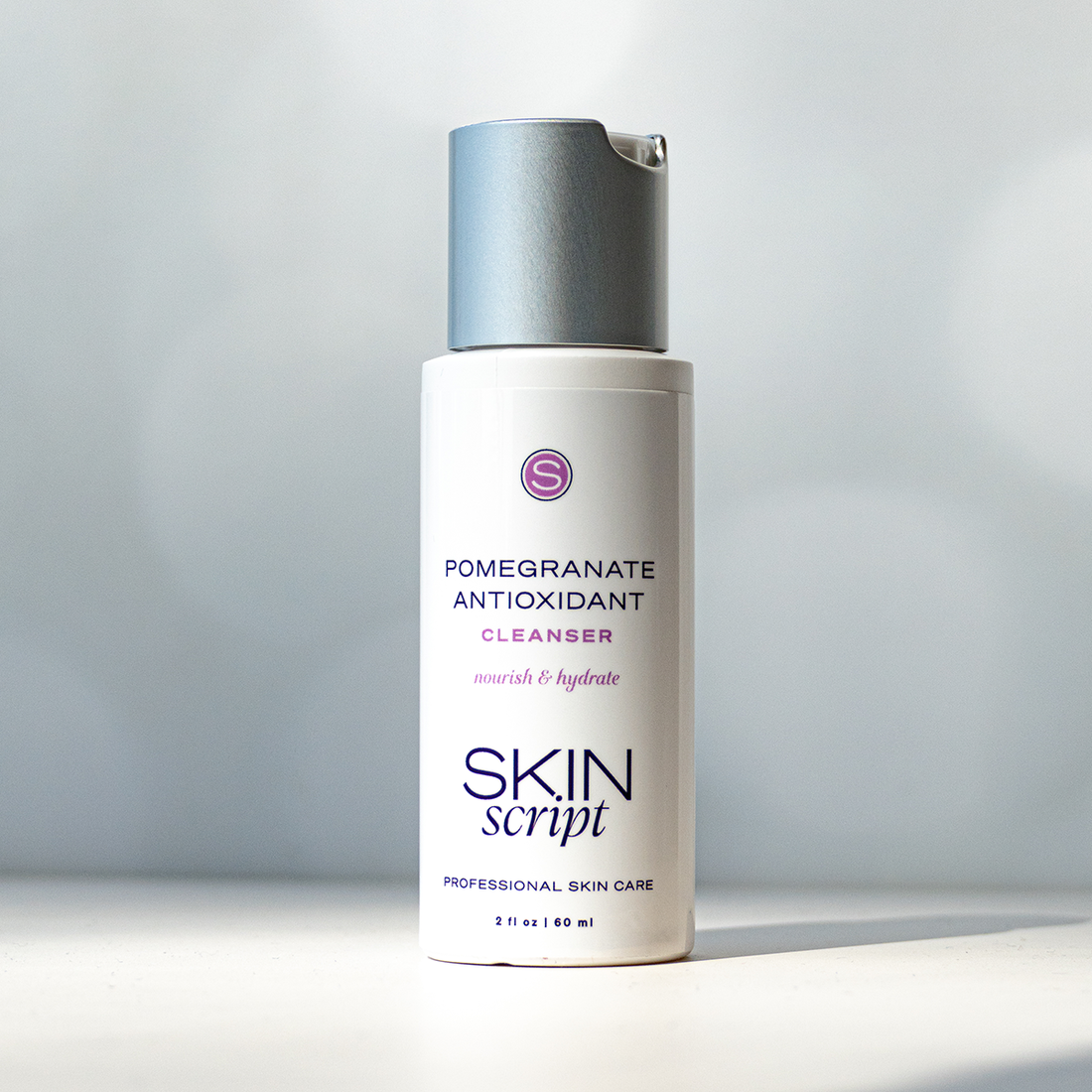 Skin Script Pomegranate Antioxidant Cleanser in a 2oz squeeze bottle